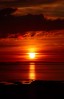 © Margaret Spencer  <em>Sunset over Canna from Ardnamurchan</em>