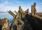 © Malcolm Walker  <em>Low water at defunct & rotting dock</em>