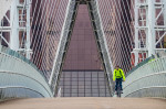 © Peter Robinson  <em>Yellow Cyclist on Millenium Bridge</em>