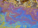© Harry Pinkerton  <em>Oil on water and rock</em>