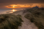 &copy; Andy Best&nbsp;&nbsp;<em>Bamburgh Castle Sunrise</em>