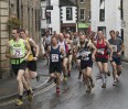 © Harry Pinkerton  <em>Settle harrier leads the main pack in the Ingleborough Fell Race</em>